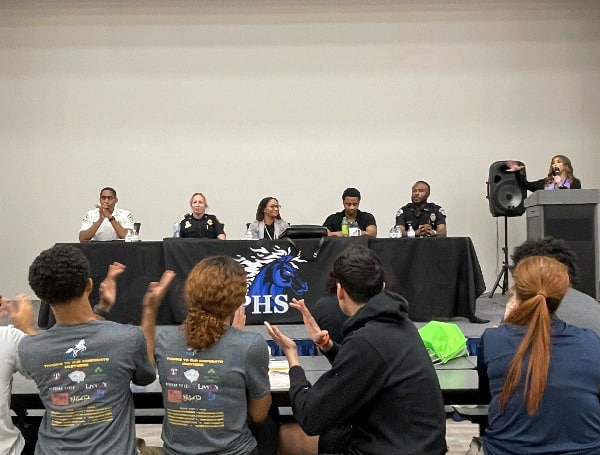 School Resource Officer Andre Jennings who is assigned to Patel High School had the idea months ago to bridge the gap between young adults and law enforcement officers. “I get the questions all the times from students about why they see things happening in their communities, it just felt right to bring the profession together to have a relaxed conversation”, he said.