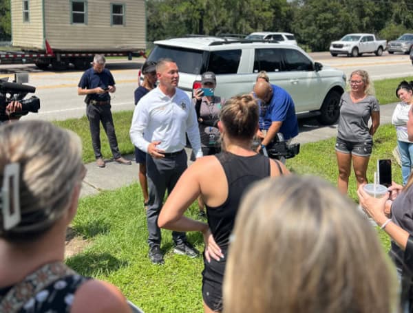 Hillsborough County Sheriff Chad Chronister speaking with parents outside of Newsome High School (X)