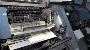 22084929 modern printing press 300x168 1